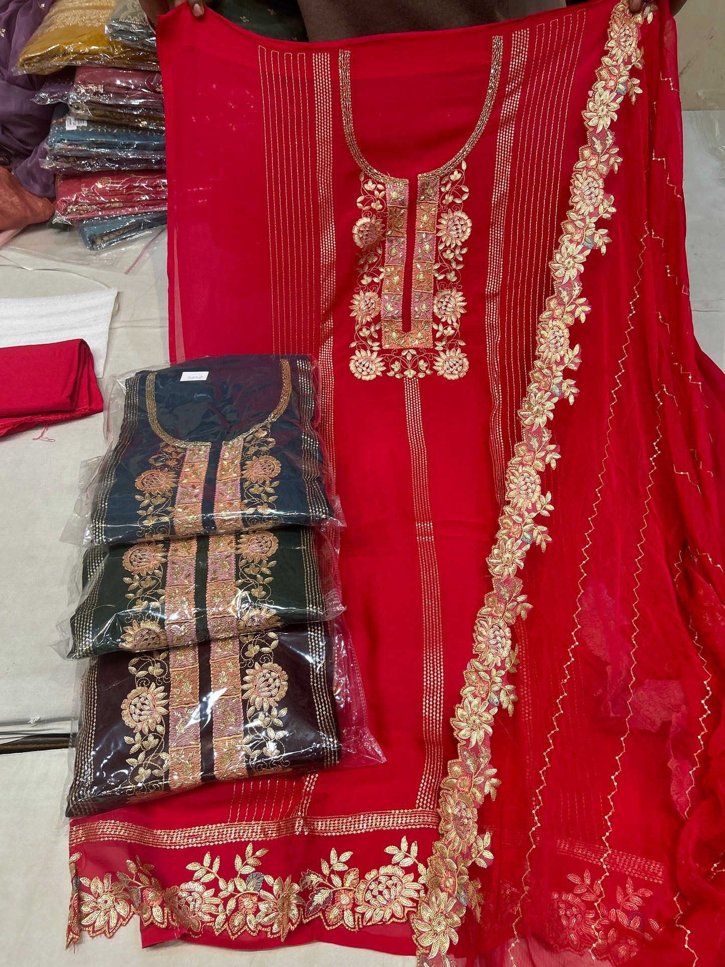 Red Fancy women Unstitched Suit