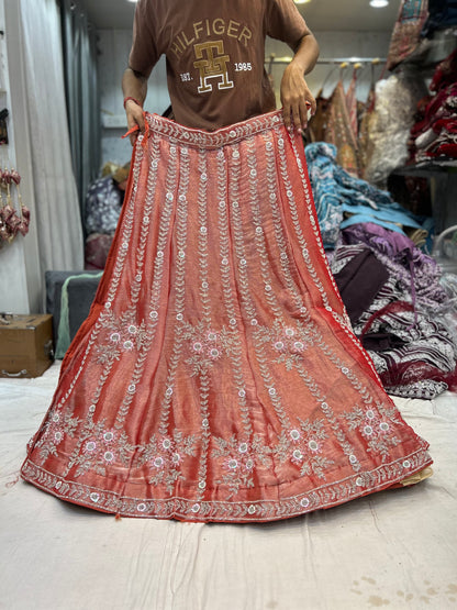 Lavishing orange peach lehenga