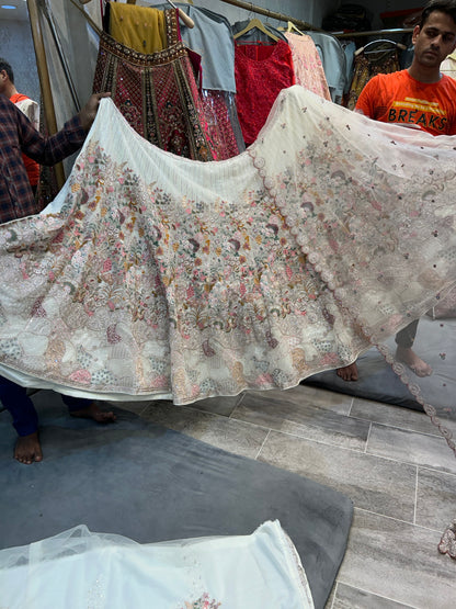 Awesome White multi flower Lehenga