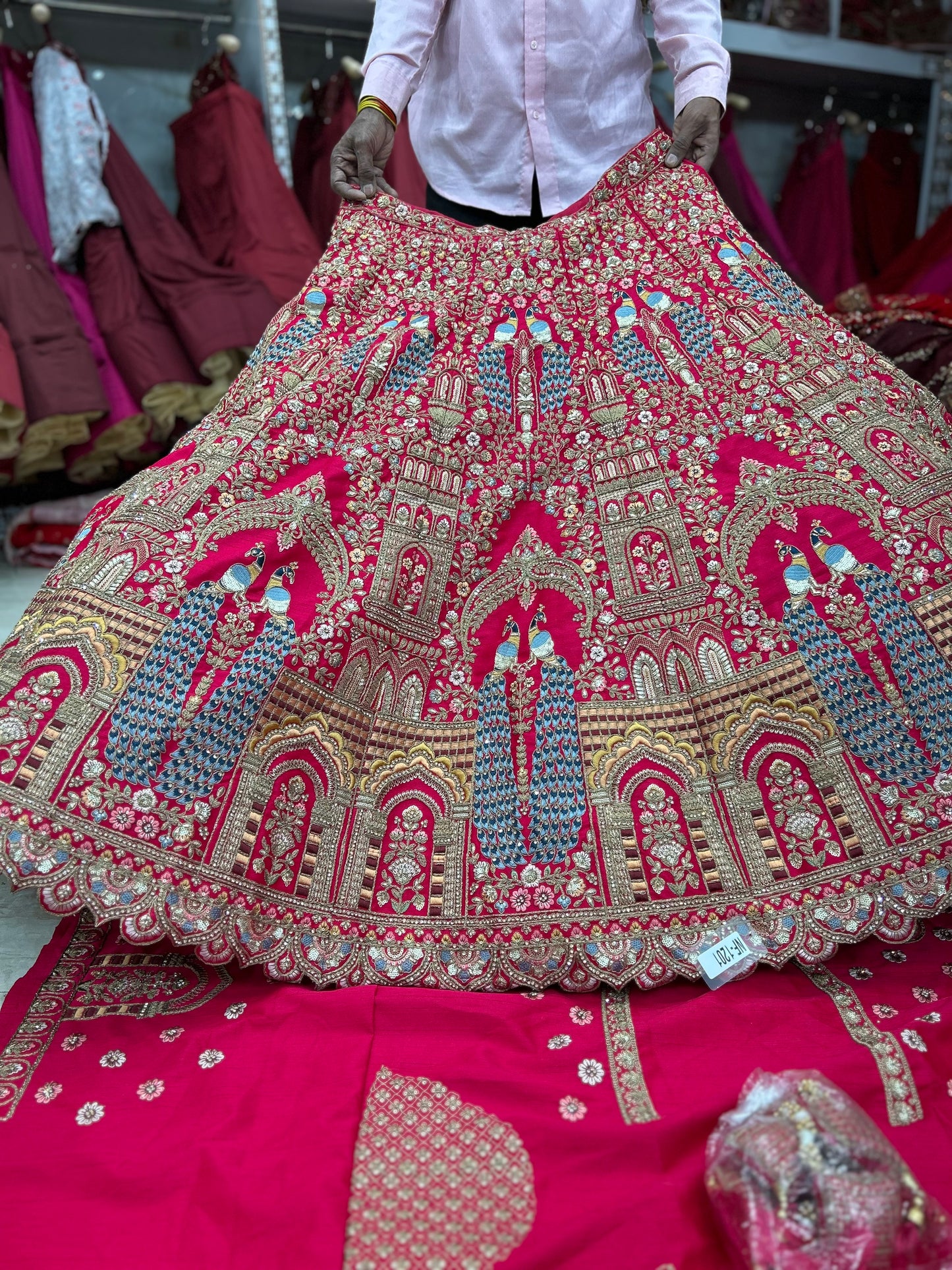 Cute red peacock bridal lehenga