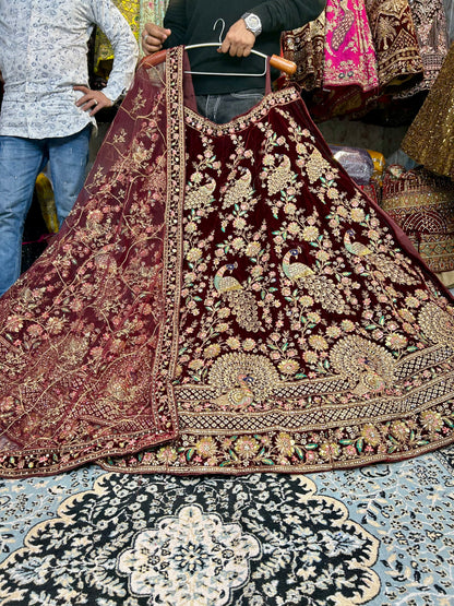 Pleasing maroon peacock bridal lehenga