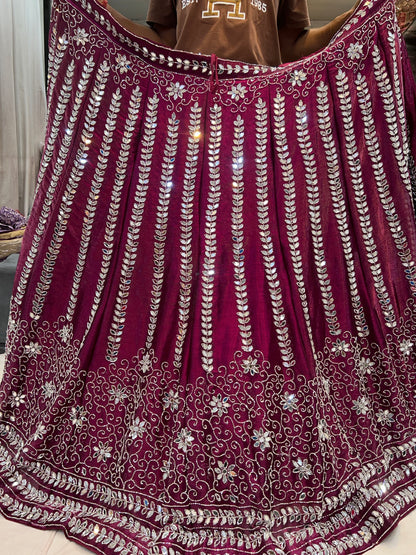 Delightful dark pink mirror work lehenga