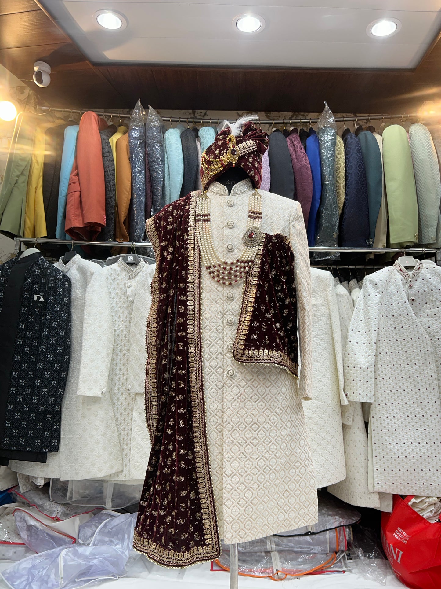 Glamorous white maroon sherwani