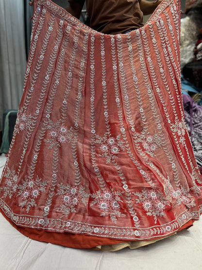 Lavishing orange peach lehenga