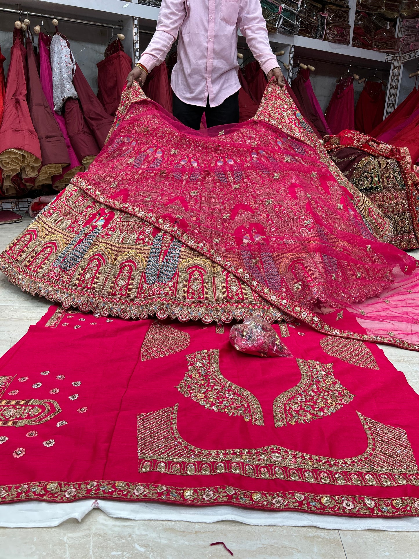 Cute red peacock bridal lehenga