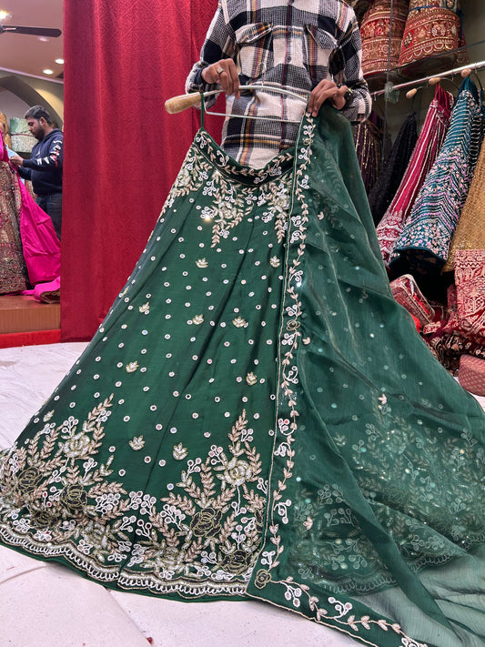 Increíble lehenga verde oscuro