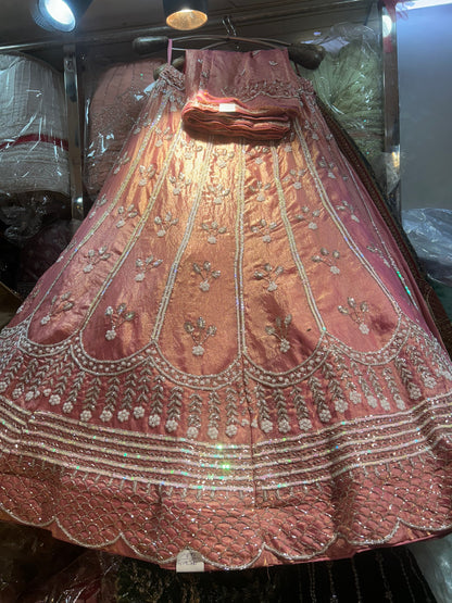 Tremendous peach pink handwork lehenga