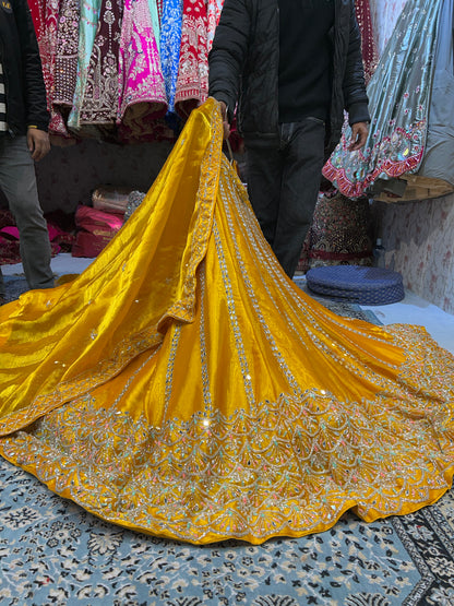 Awesome yellow haldi mehendi mirror work lehenga