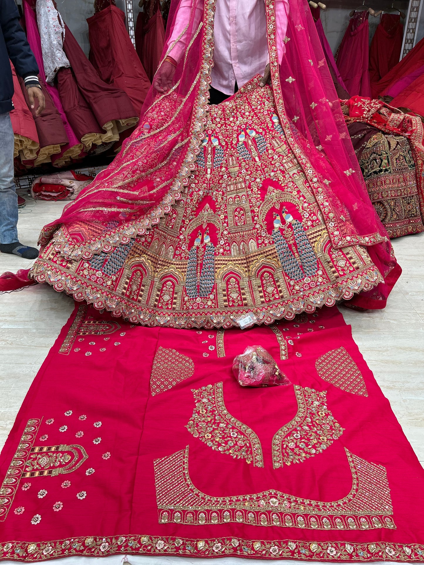 Cute red peacock bridal lehenga