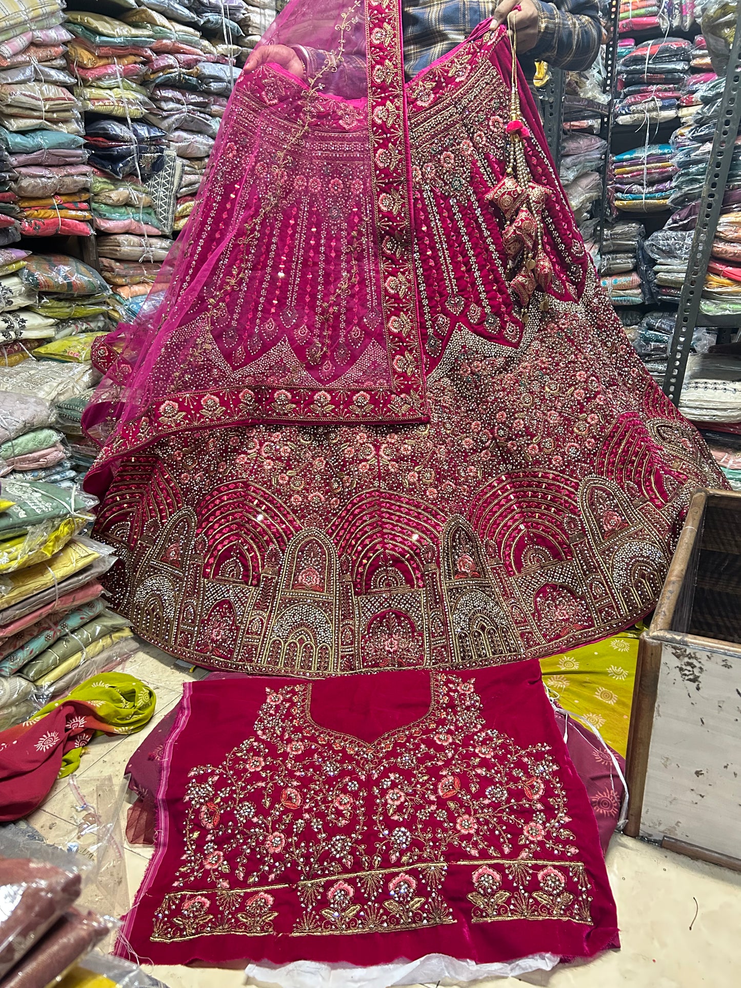 Awesome red jhumka bridal lehenga