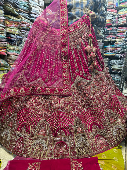 Awesome red jhumka bridal lehenga