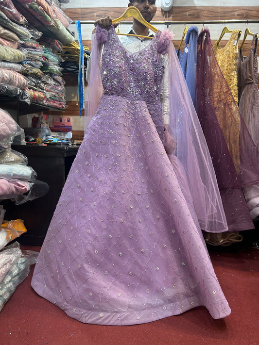 Lehenga morada de niña