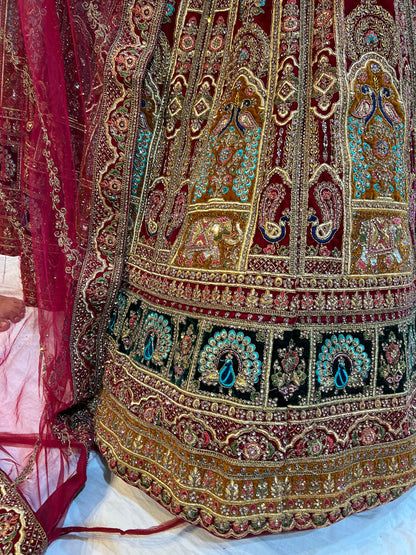 Astonishing red peacock bridal Lehenga