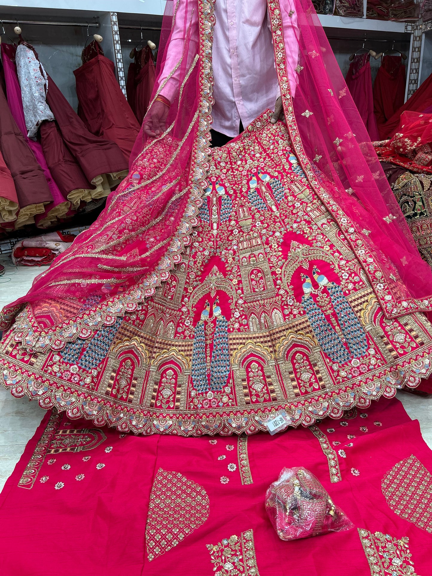 Cute red peacock bridal lehenga