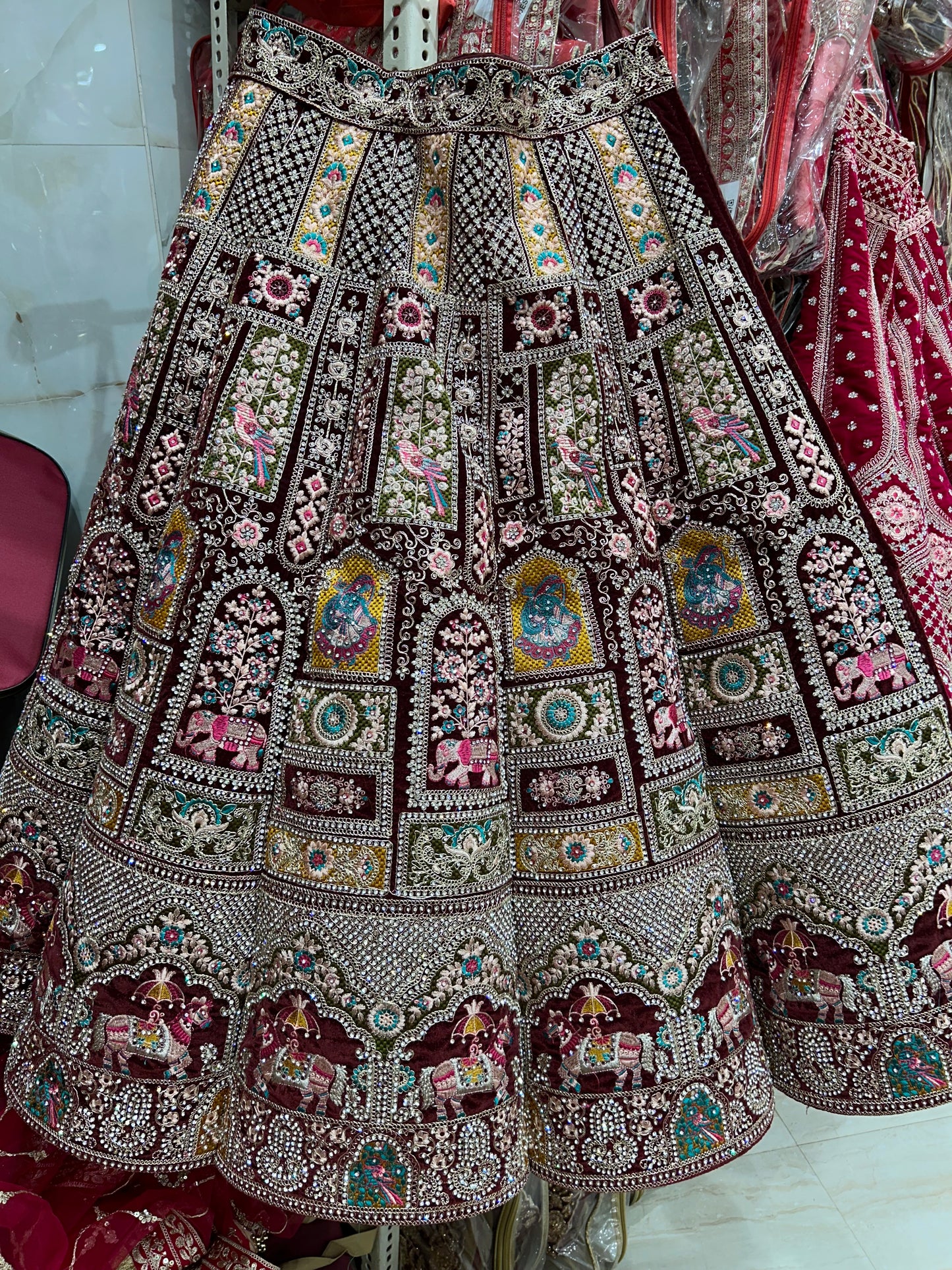 Extraordinary maroon Ball figure Lehenga