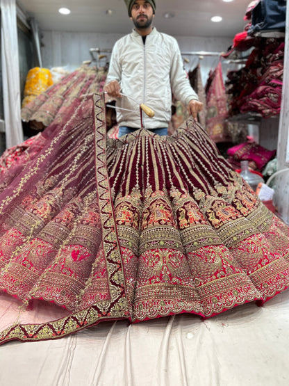 Eye catching maroon doli Barat peacock ball bridal lehenga