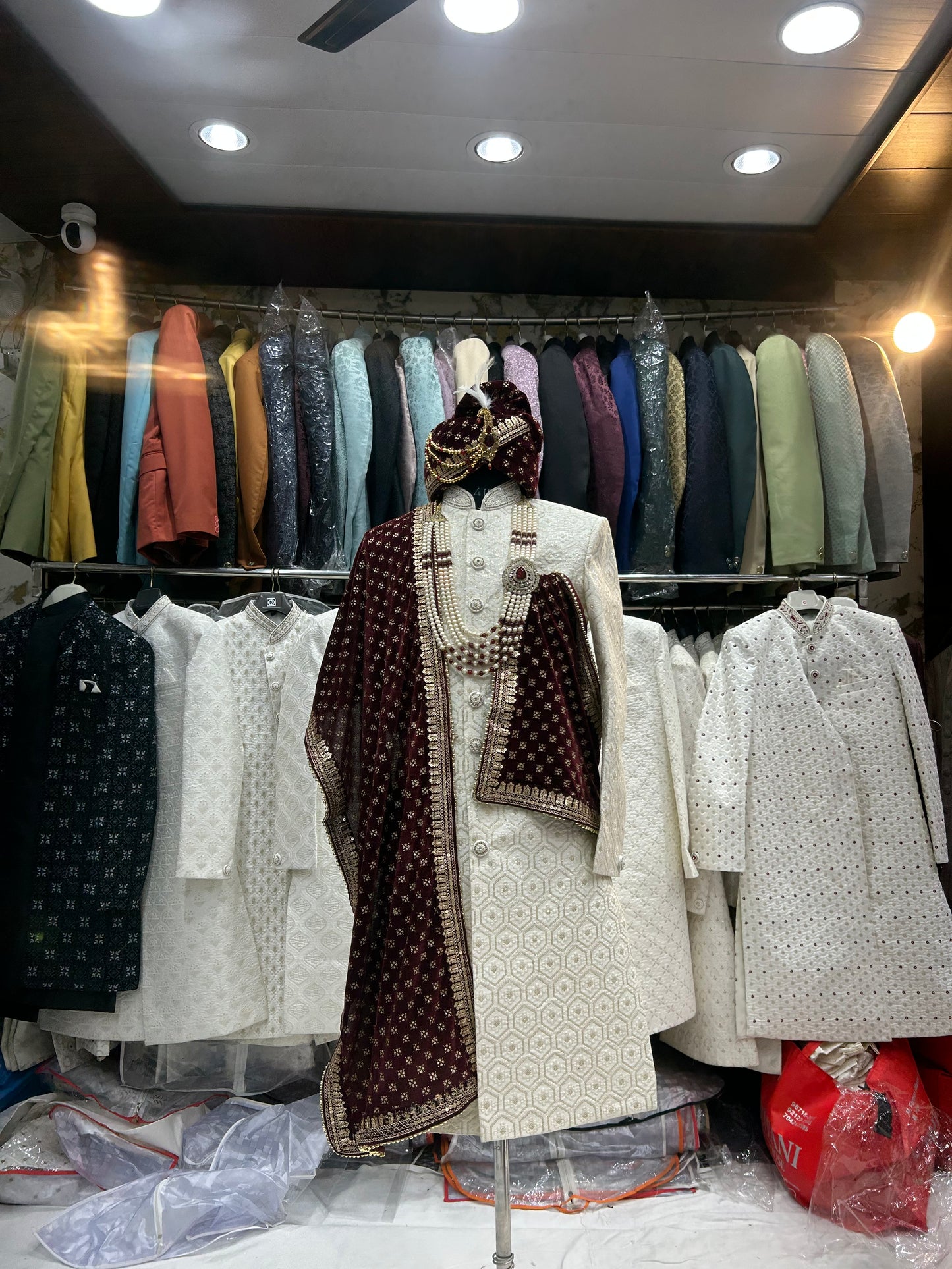 Glamorous white maroon sherwani