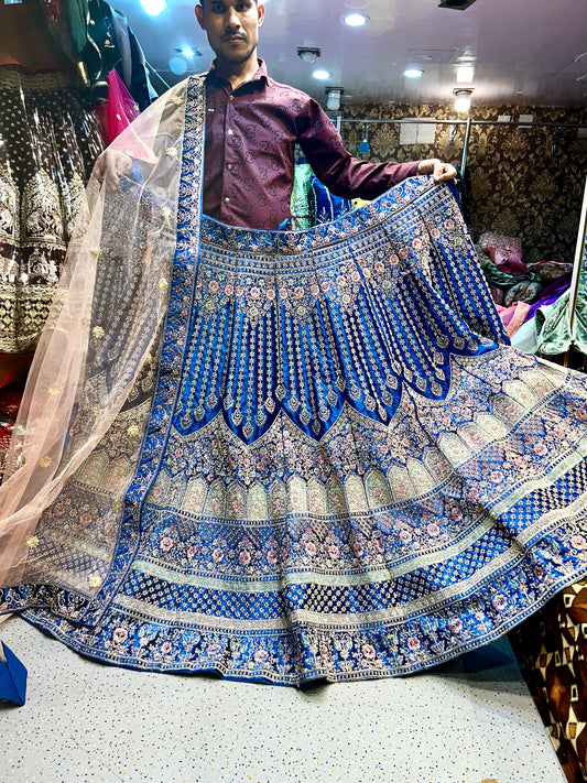 Jhumka Lehenga de color azul con estilo