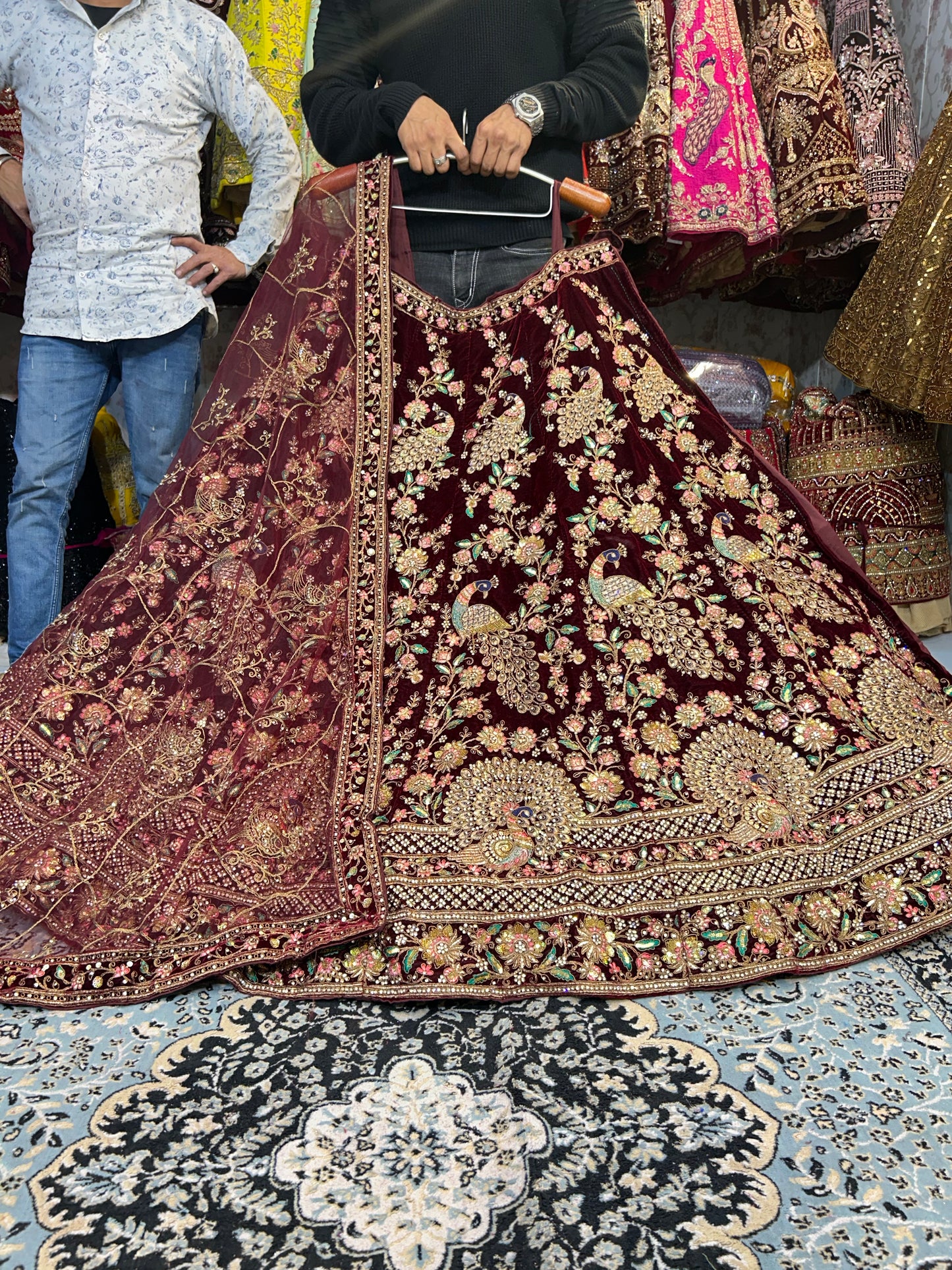 Pleasing maroon peacock bridal lehenga