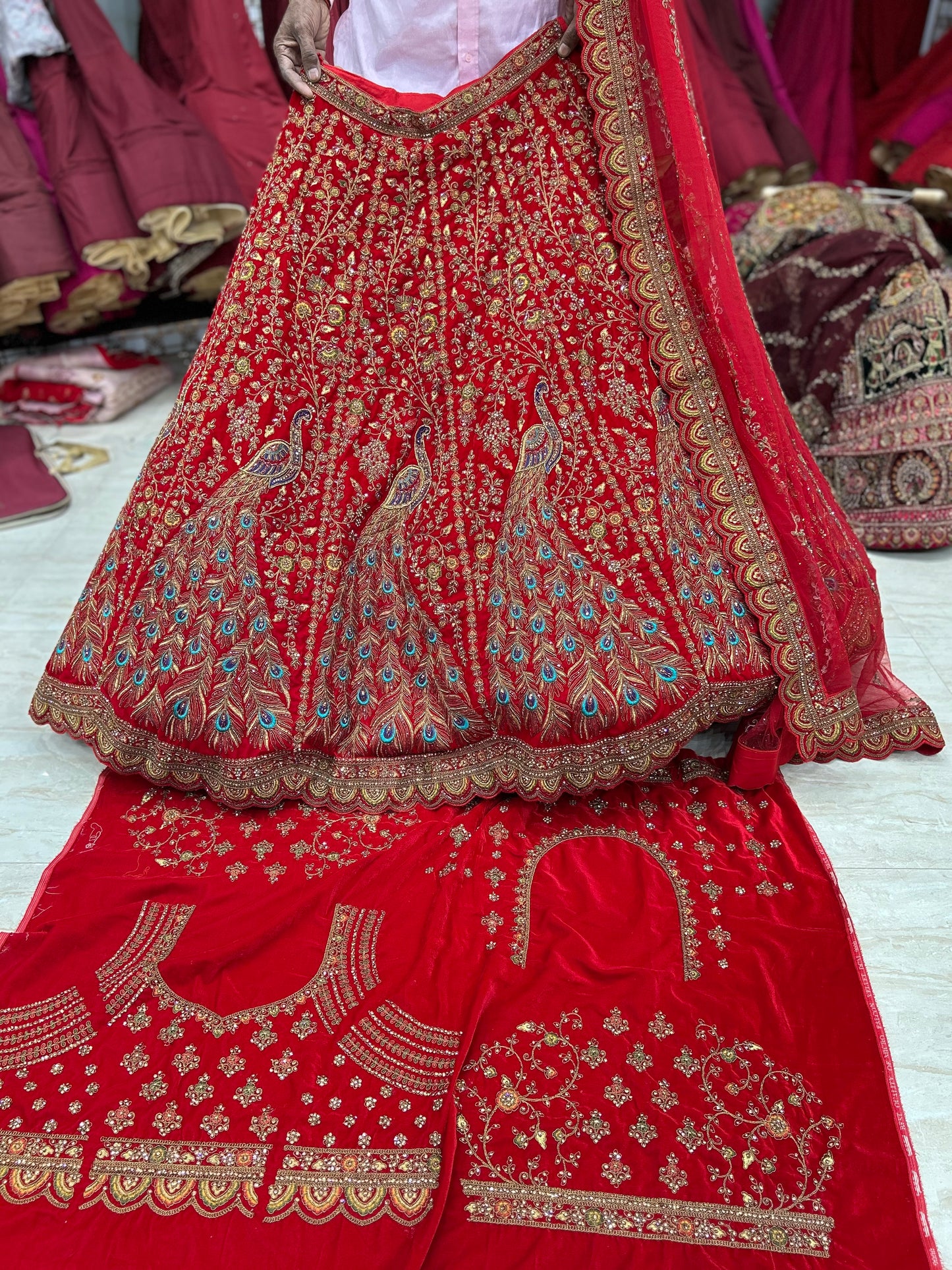 Wow red peacock bridal lehenga