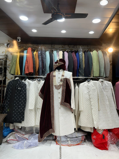 Good looking maroon white sherwani