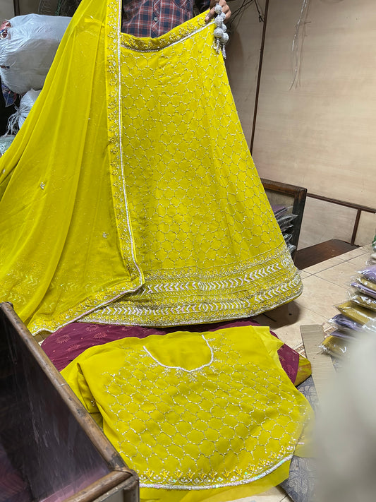 Trendy yellow haldi mehendi lehenga