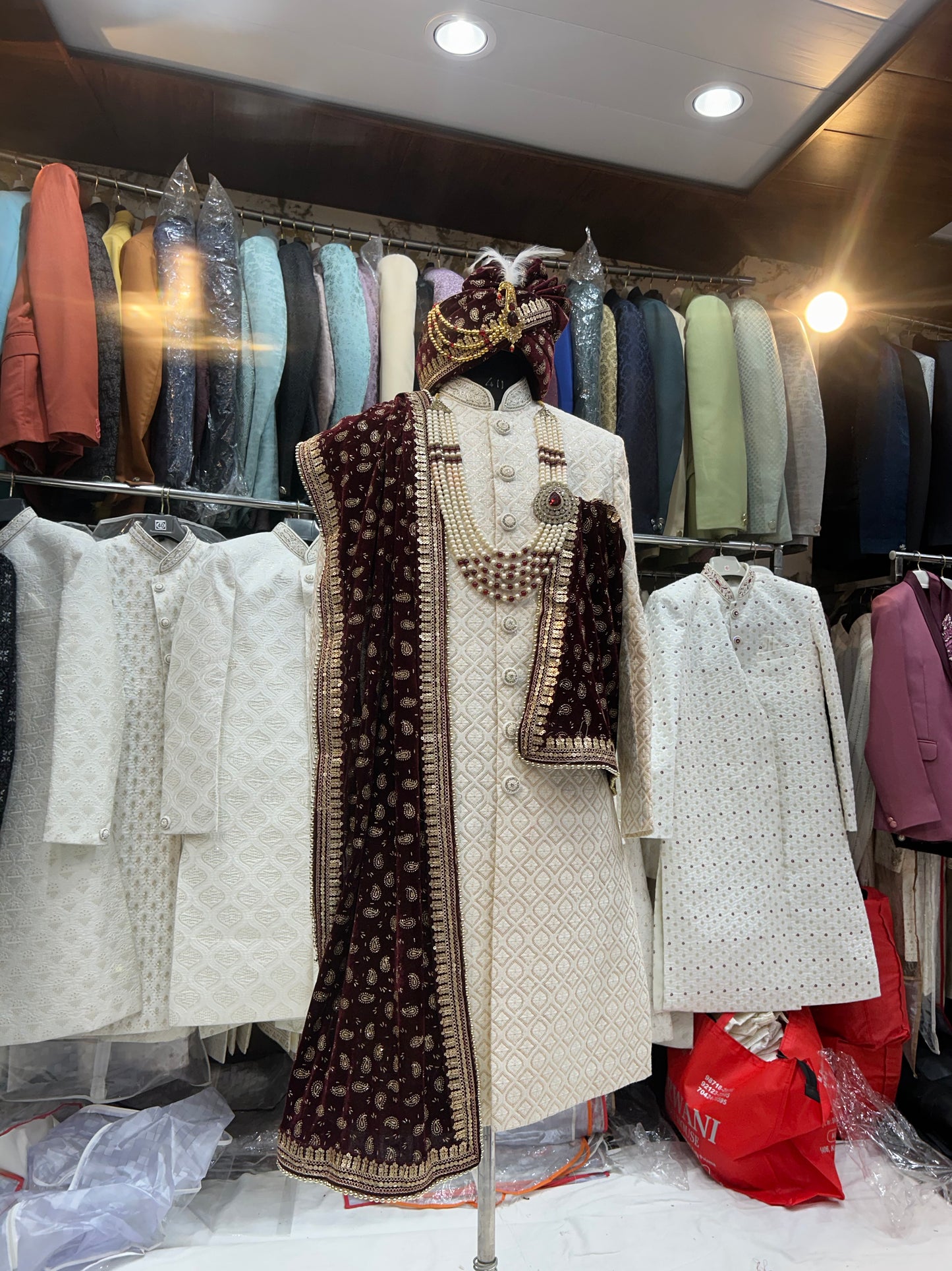 Glamorous white maroon sherwani