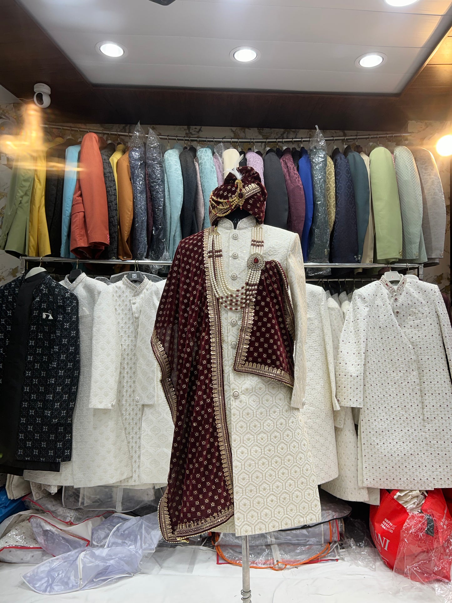 Glamorous white maroon sherwani