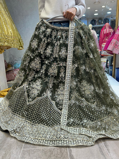 Pleasing dark green lehenga