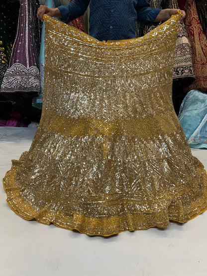 Haldi mehendi golden Lehenga