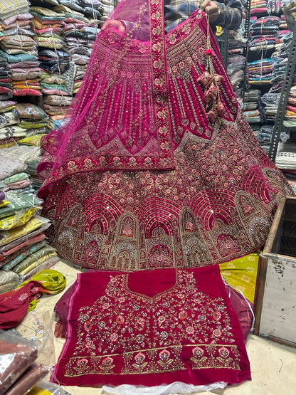 Awesome red jhumka bridal lehenga