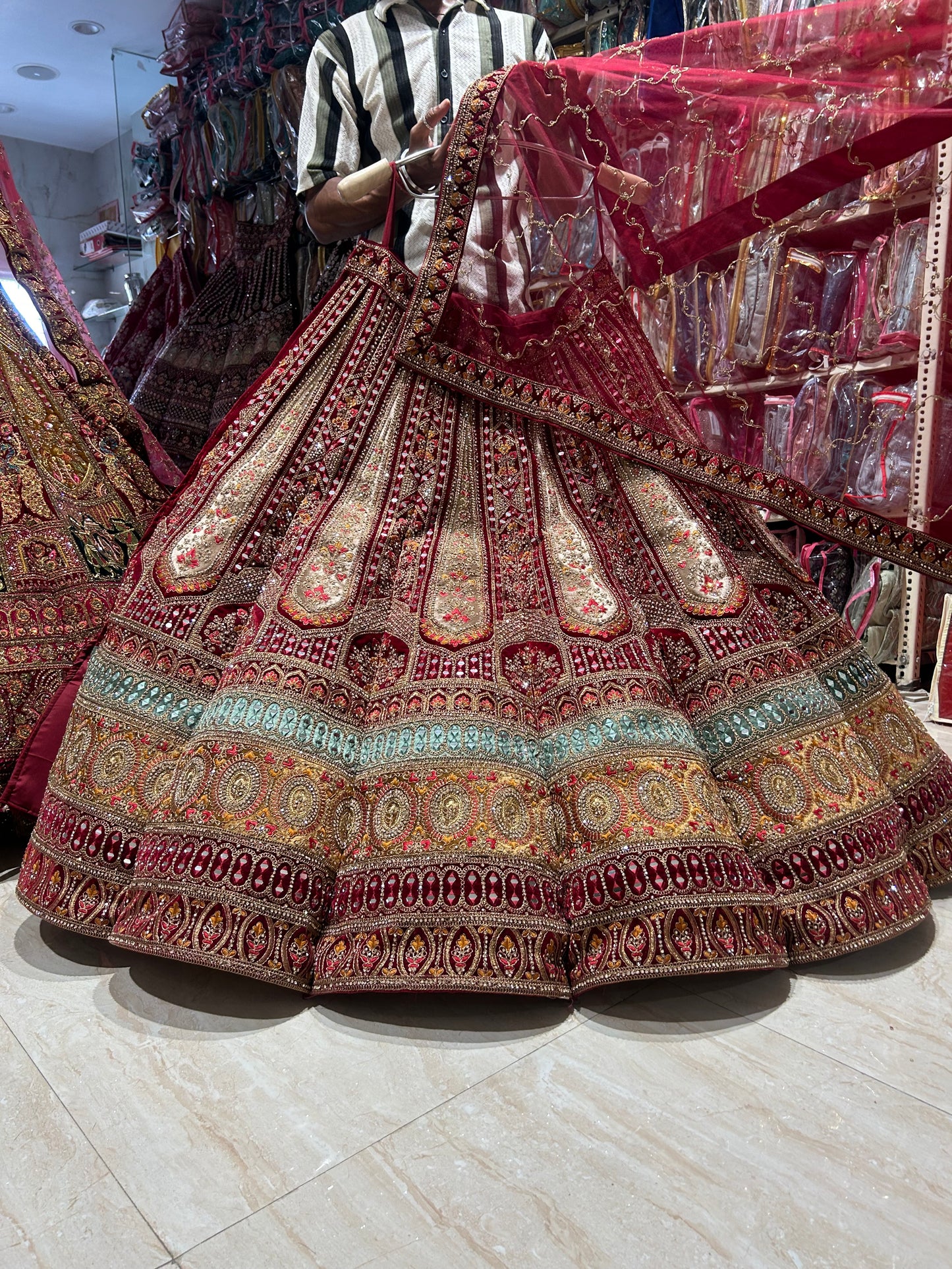 Red handwork ball bridal Lehenga