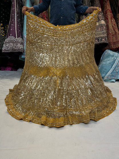 Haldi mehendi golden Lehenga