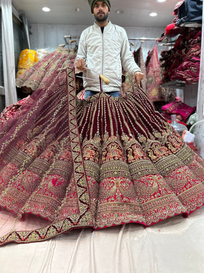 Eye catching maroon doli Barat peacock ball bridal lehenga