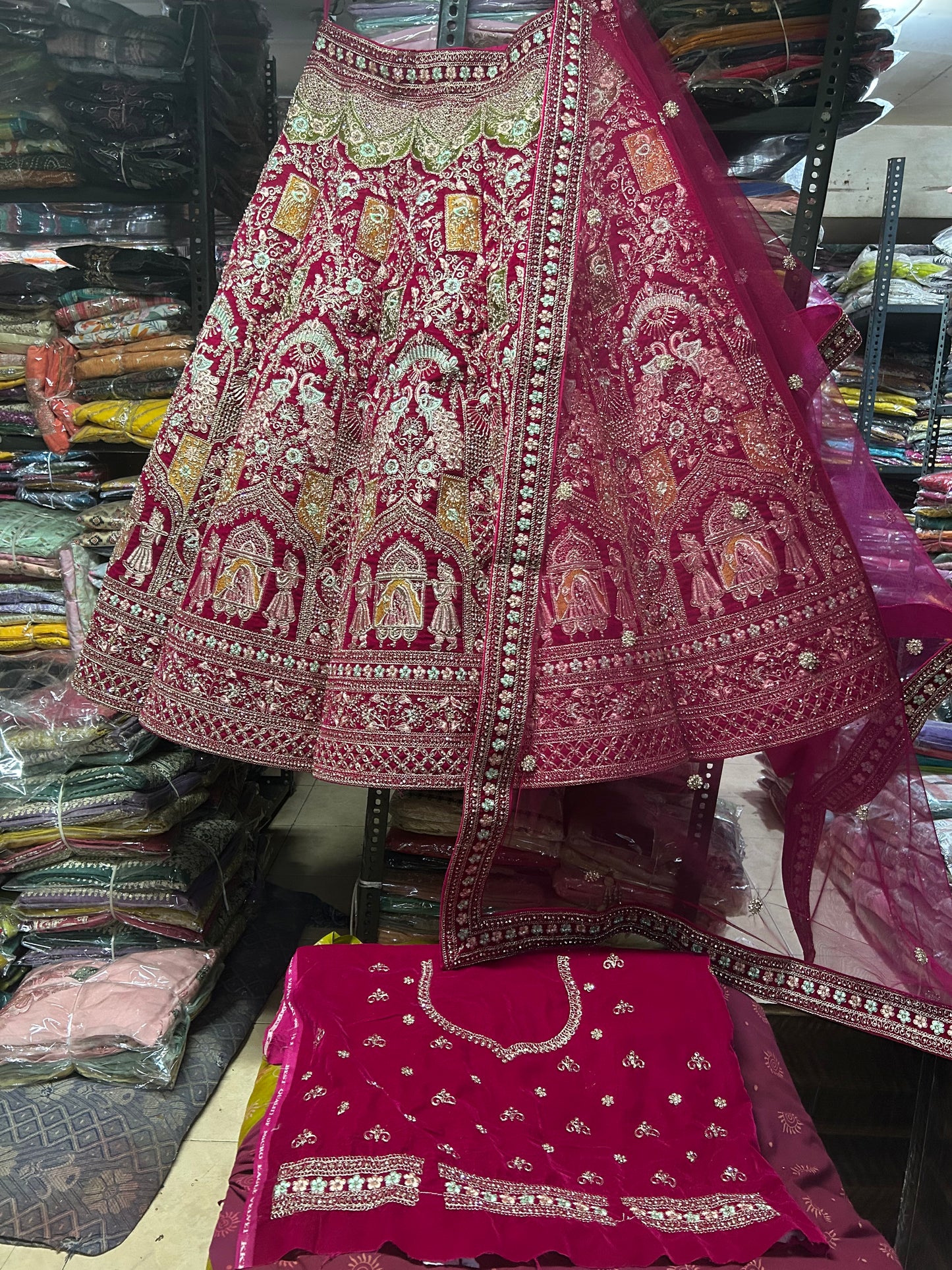 Lavishing red doli Barat bridal lehenga