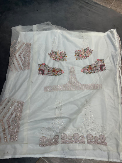 Awesome White multi flower Lehenga