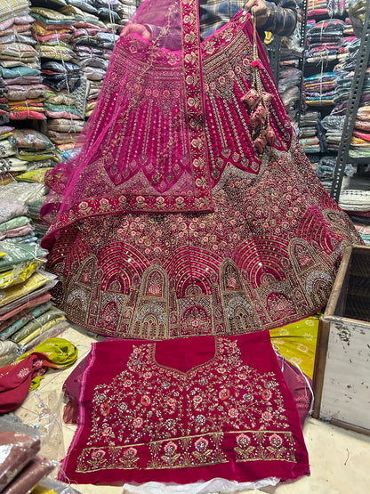 Awesome red jhumka bridal lehenga