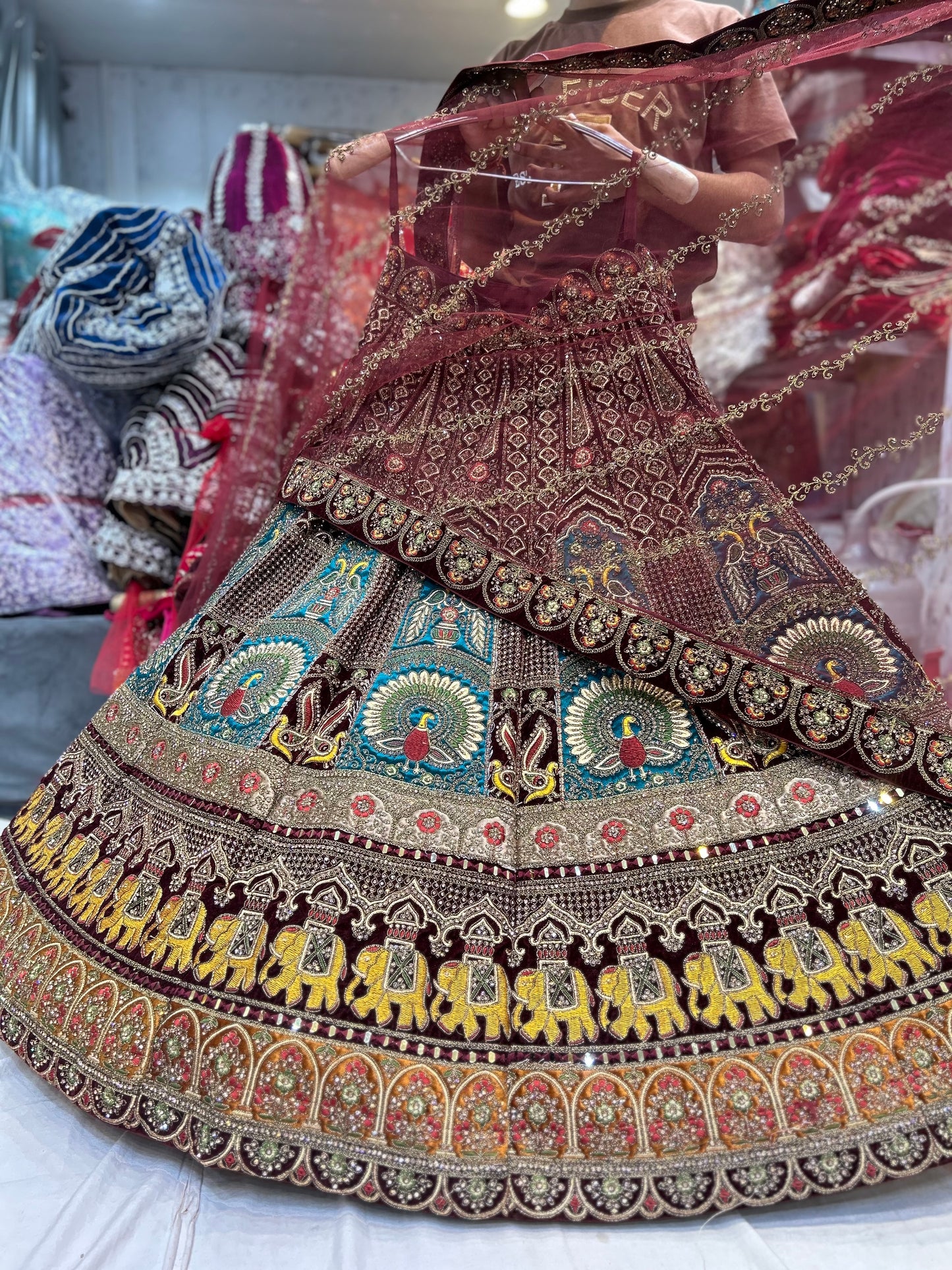 Beautiful peacock maroon bridal lehenga