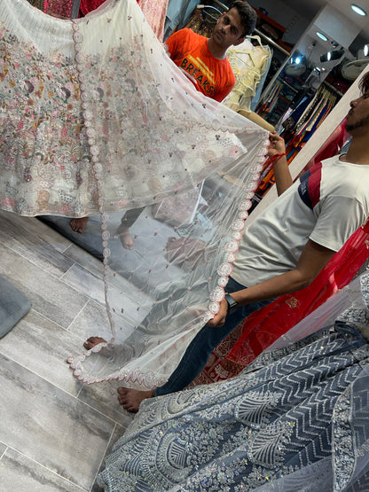 Awesome White multi flower Lehenga