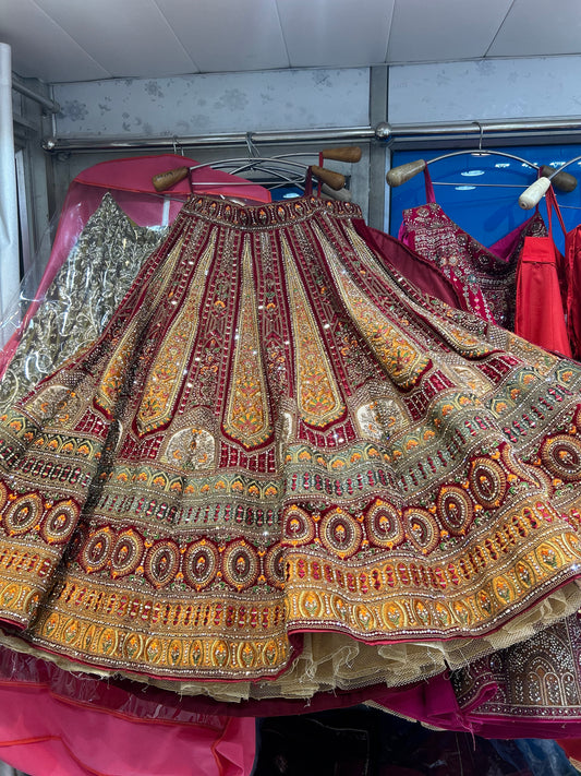 Wow maroon golden bridal lehenga