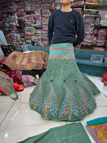 Pretty green peacock lehenga