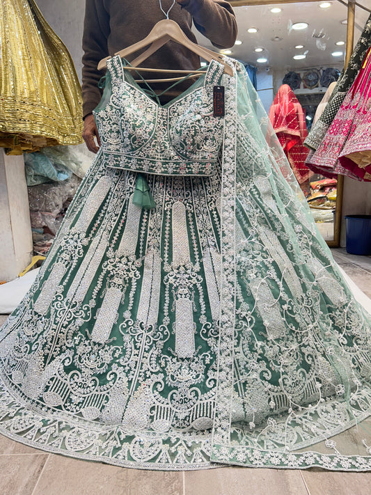 Fantástica lehenga verde plateada