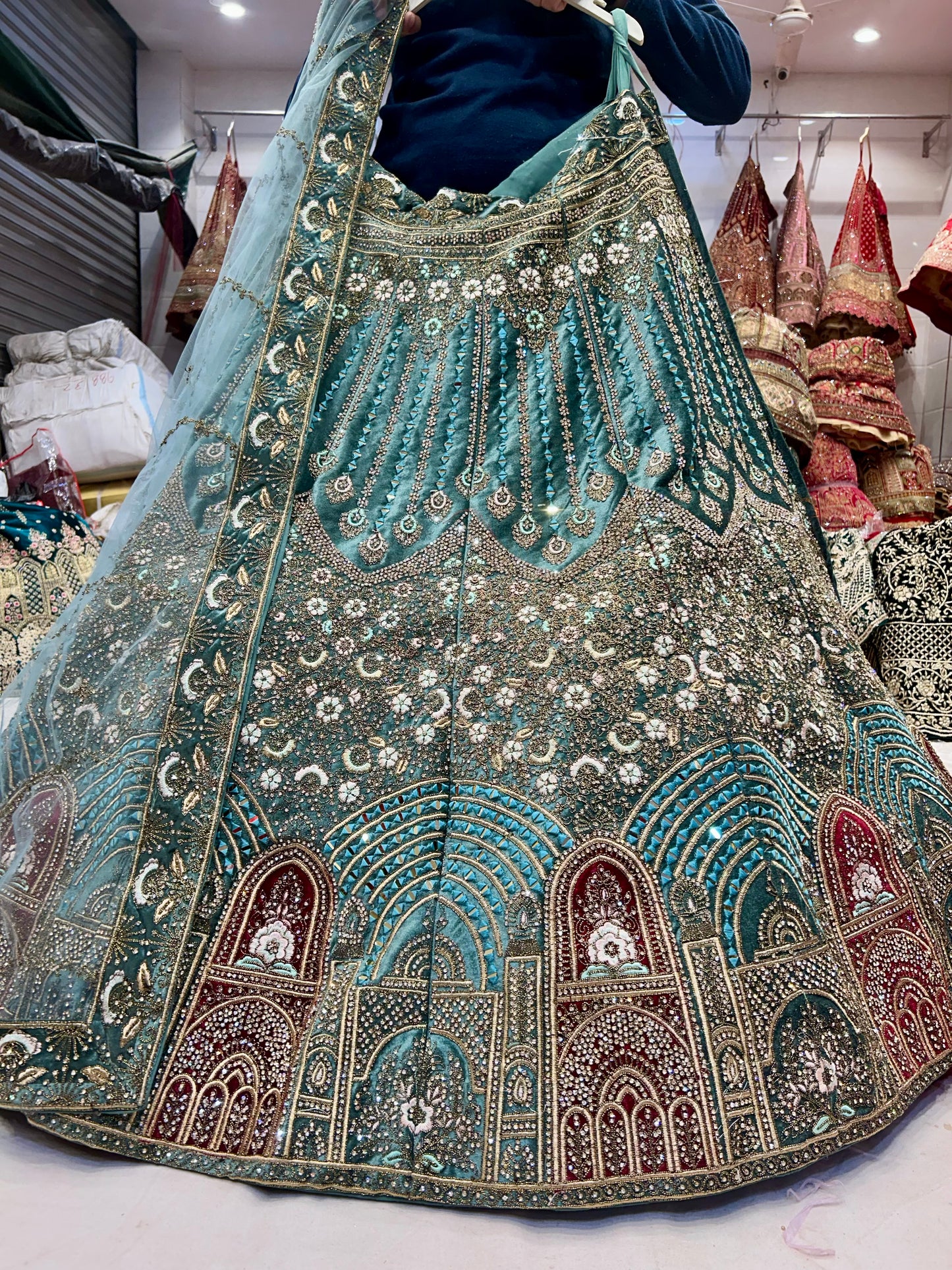 Astonishing teal blue jhumka lehenga