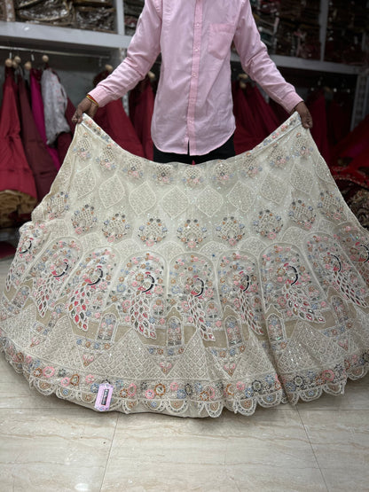 Elegant white peacock lehenga