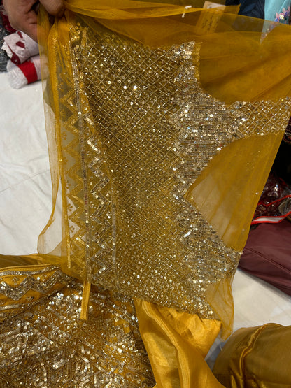 Haldi mehendi golden Lehenga