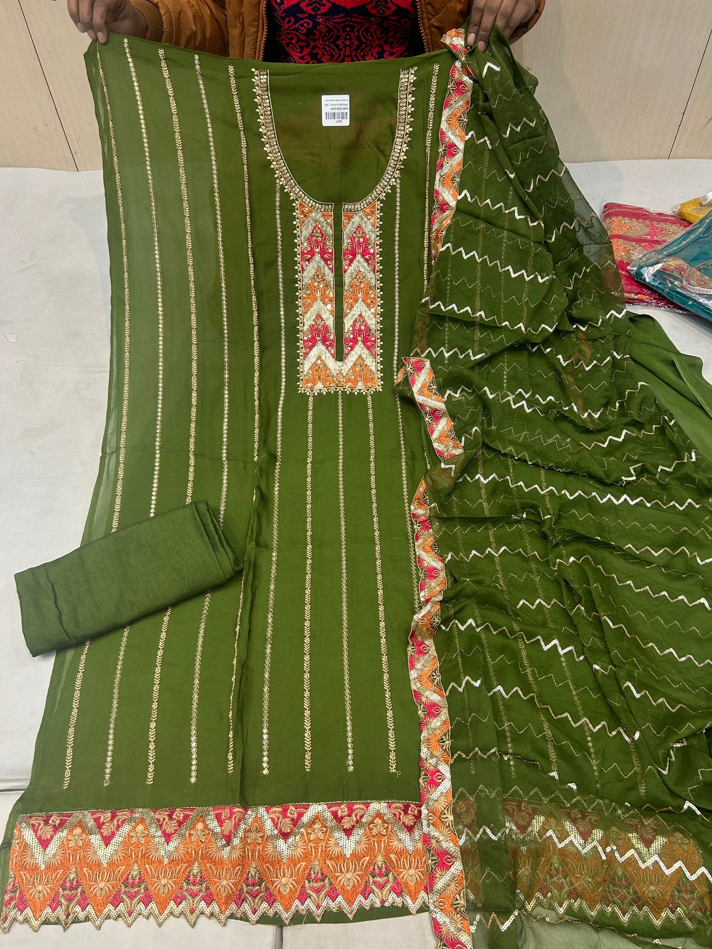 Green Fancy women Unstitched Suit