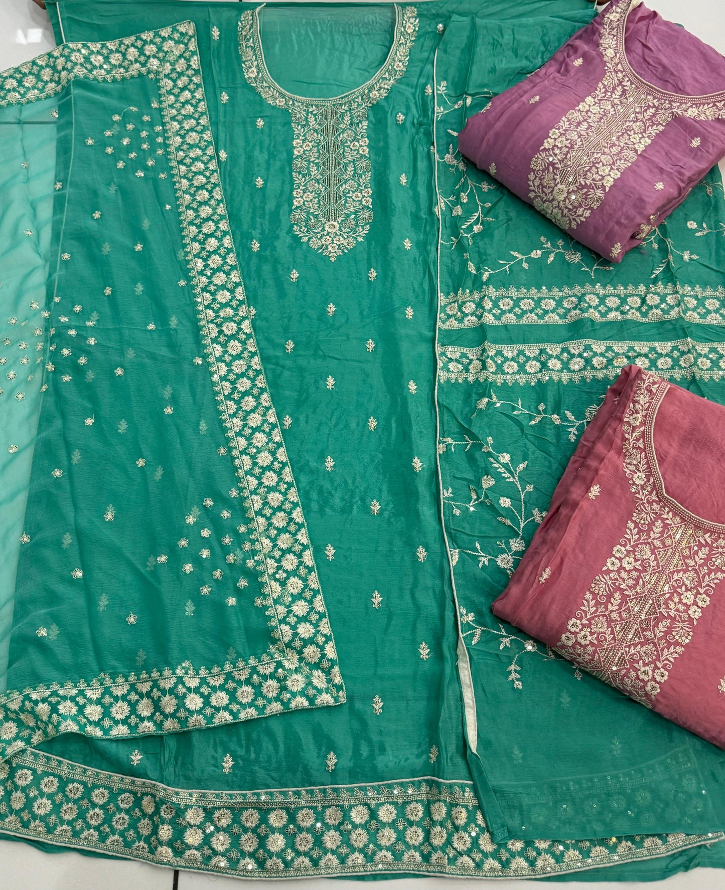 Pretty green unstitched Salwar suits dress material (free size)