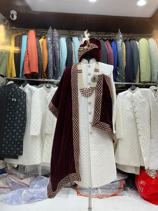 Good looking maroon white sherwani