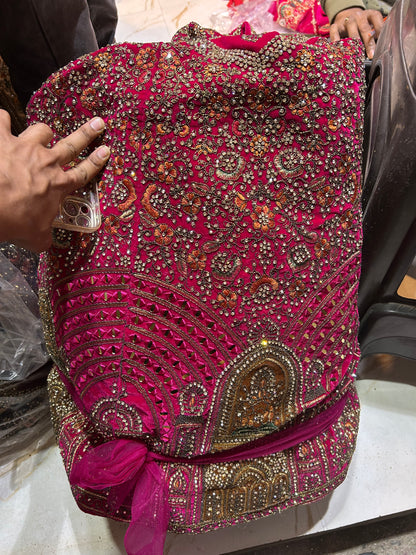 Tremendous pink jhumka bridal lehenga