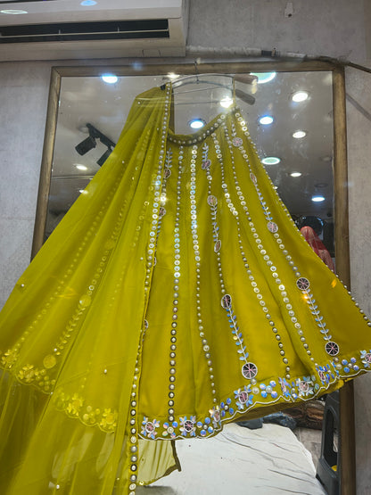 Yellow haldi mehendi mirror work Lehenga